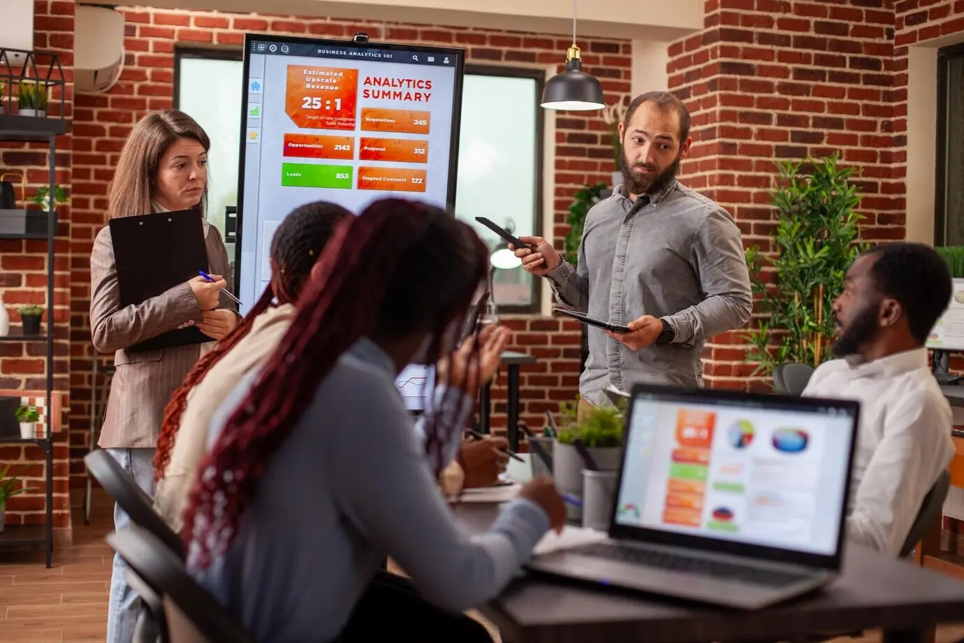Business team examining digital data