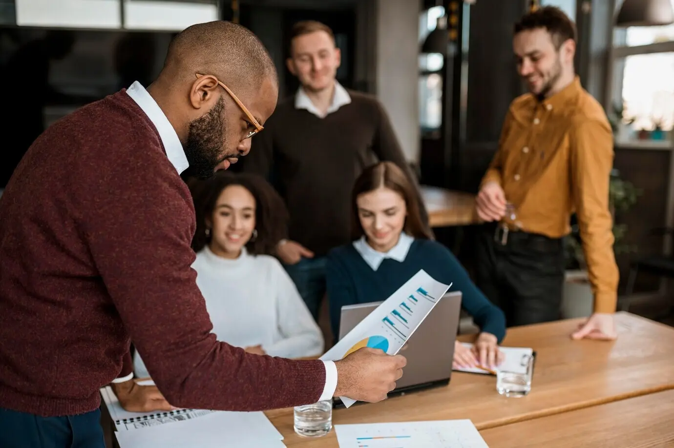 Coworkers holding a meeting in the office